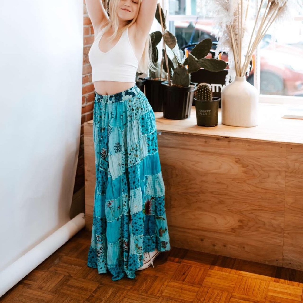 Blue long skirt with red floral patterns, worn once